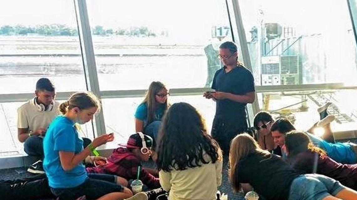 
A group of recently graduated eighth-graders from Chowchilla’s Wilson Middle School wait in vain Saturday at Fresno Yosemite International Airport for a US Airways flight on a class trip to Washington, D.C. Eleven students and four chaperones were stuck at the airport for more than 14 hours as their connecting flight to Phoenix was repeatedly delayed and ultimately canceled.
