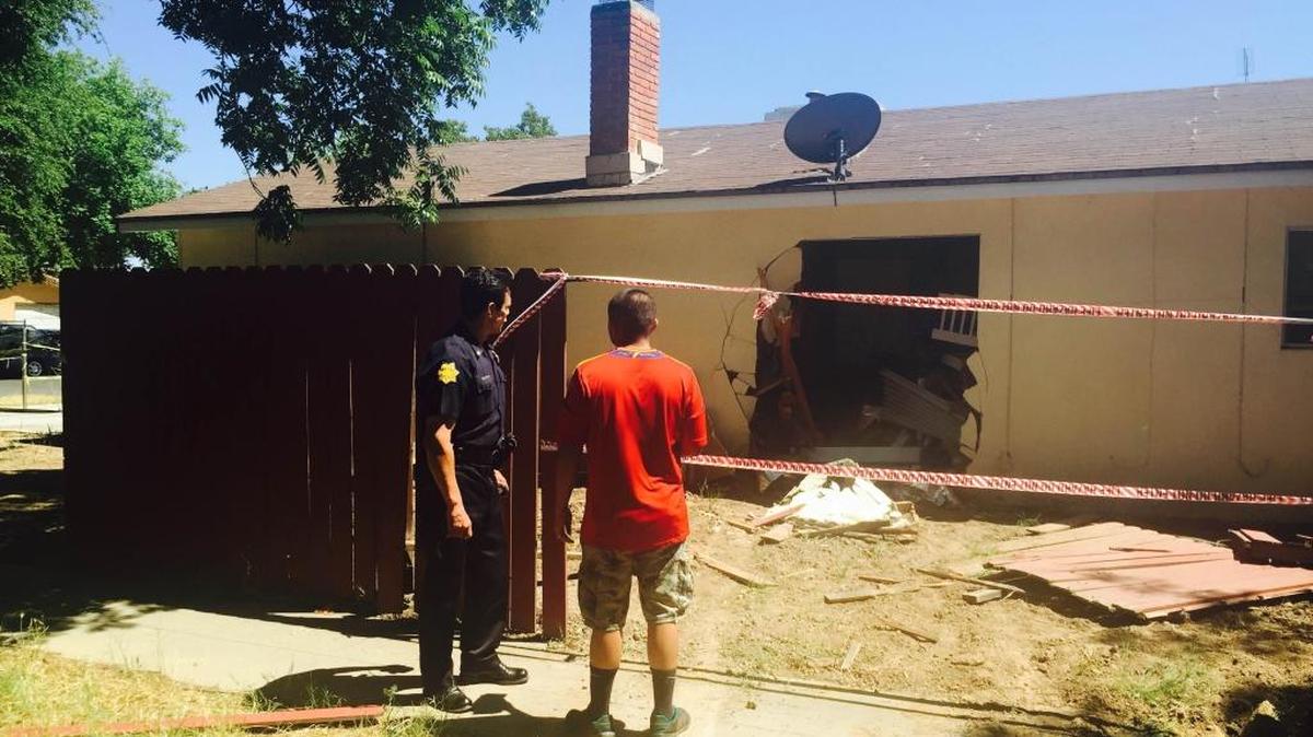 No one was injured Thursday when a 70-year-old man accidentally backed his car into a neighbor’s home in central Fresno.