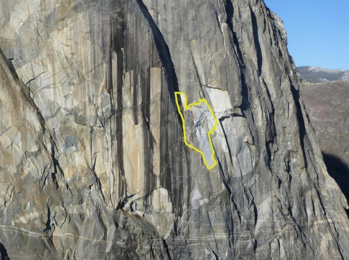 A photo provided by Yosemite National Park shows the area on El Capitan’s East Buttress, outlined in yellow, where a large sheet of granite fell Wednesday, Sept. 27, 2017.