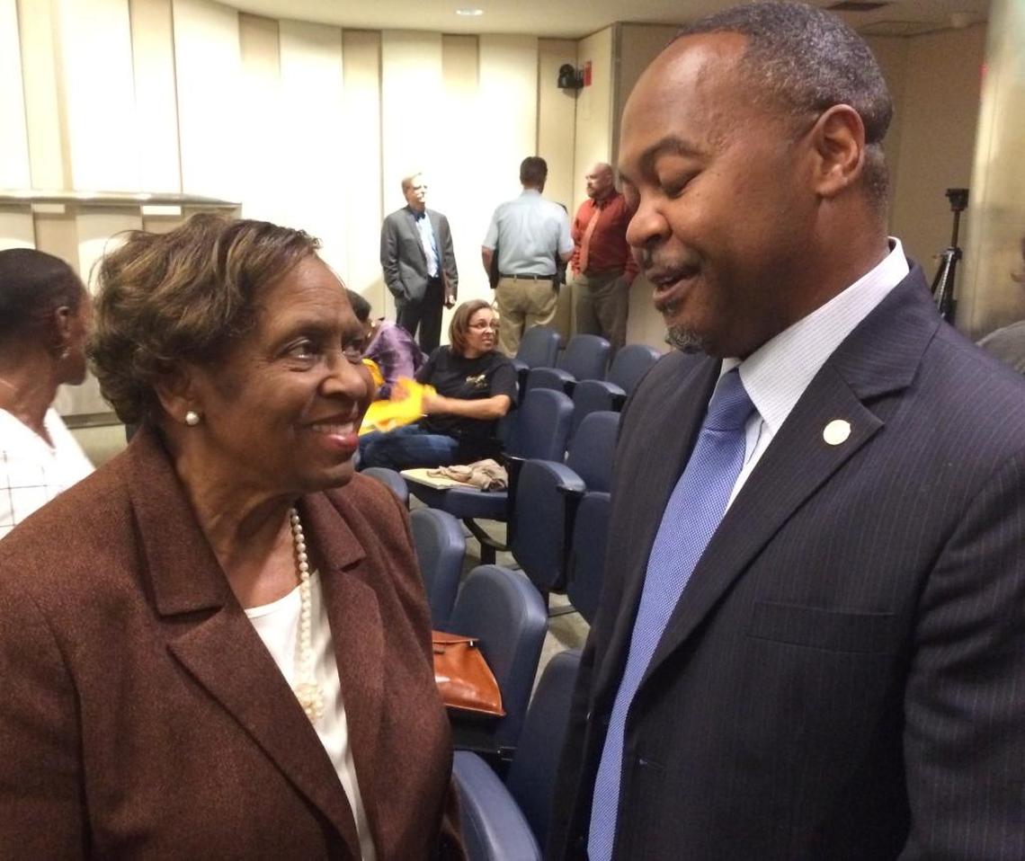 Longtime southwest Fresno resident Mary Curry and Fresno City Councilmember Oliver Baines celebrate after the council in October 2017 approved an agreement with Darling International for the company to move its meat-rendering plant out of a southwest neighborhood.