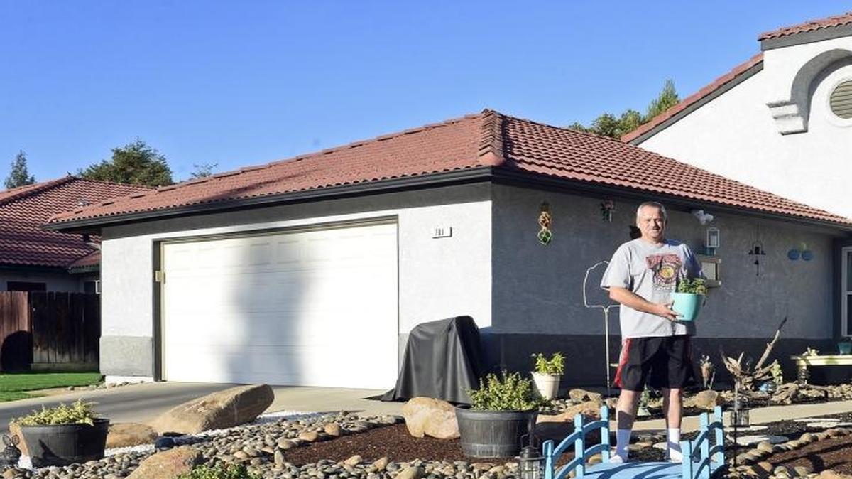 
When the drought-related water restrictions were enacted earlier this year in Clovis, Terry Mackey and his wife Marcie knew they’d have an even harder time keeping their front lawn green. So they built their own low-maintenance, low-water-use xeriscape. 
