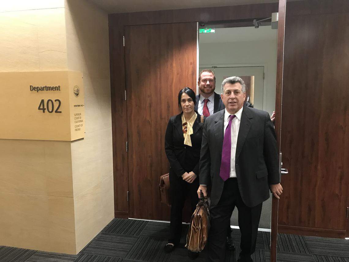 On Monday, May 14, 2018, Fresno attorney Warren Paboojian emerges from a Fresno courtroom with his client, Jeanette Ortiz, and co-counsel Adam Stirrup after reaching a confidential settlement with Chipotle Mexican Grill. A Fresno Superior court jury on Thursday, May 10, 2018, ordered Chipotle to pay  $7.9 million in damages to Ortiz for wrongfully firing her in January 2015. On Monday, May 14, 2018, the fast-food giant reached a confidential settlement with Ortiz, rather than face punitive damages.