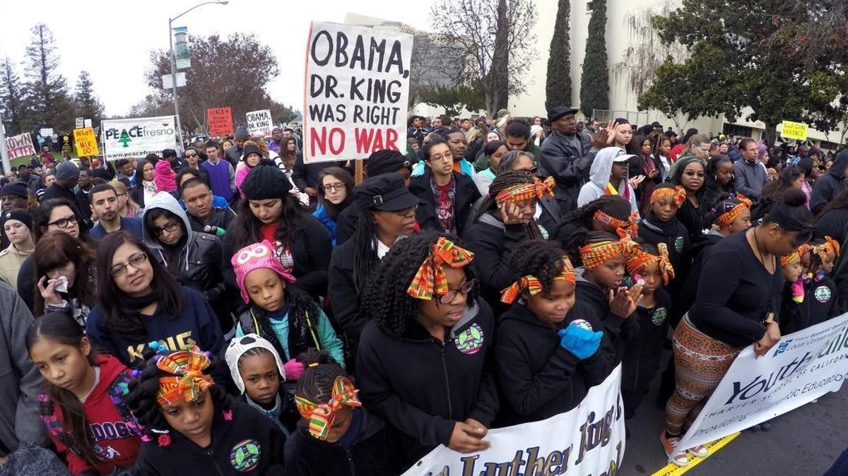 Students from Martin Luther King Elementary School in southwest Fresno join in the 2014 Martin Luther King Jr. Day March in front of Fresno City Hall.