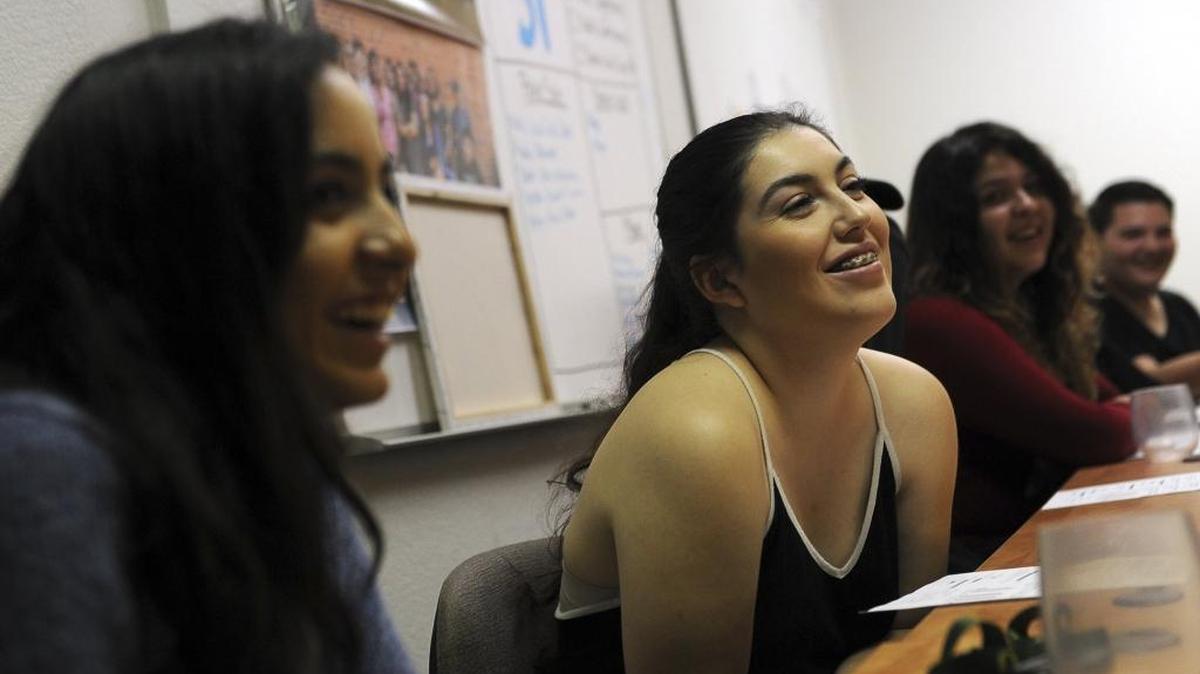 Maya Vannino, 17, left, and Gabrielle Rivas, 21, right, part of The Know Youth Media project, discuss the survey on sex education during a roundtable meeting Wednesday, Oct. 18, 2017 in Fresno. The survey has become national news, because of reaction from the community.