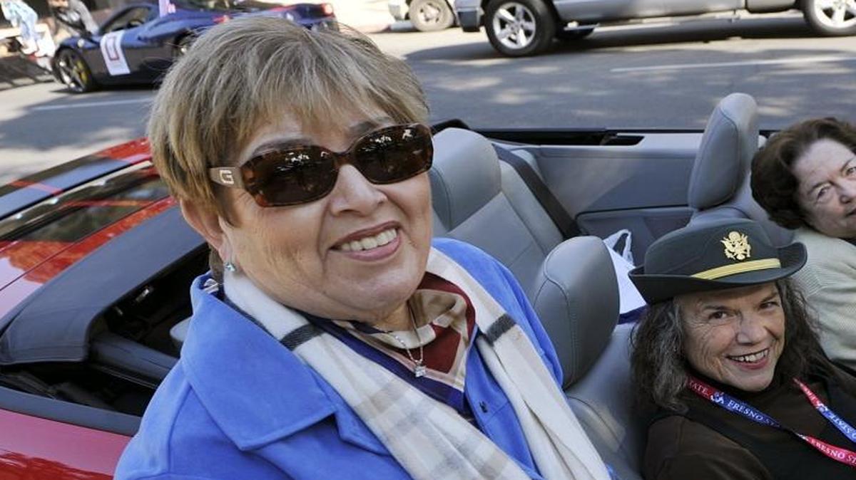 Pilar De La Cruz, left, pictured with Marie Hoemke, center, and Pamela Loewen, right, before the start of the 95th Fresno Veteran’s Day Parade Wednesday in downtown Fresno.