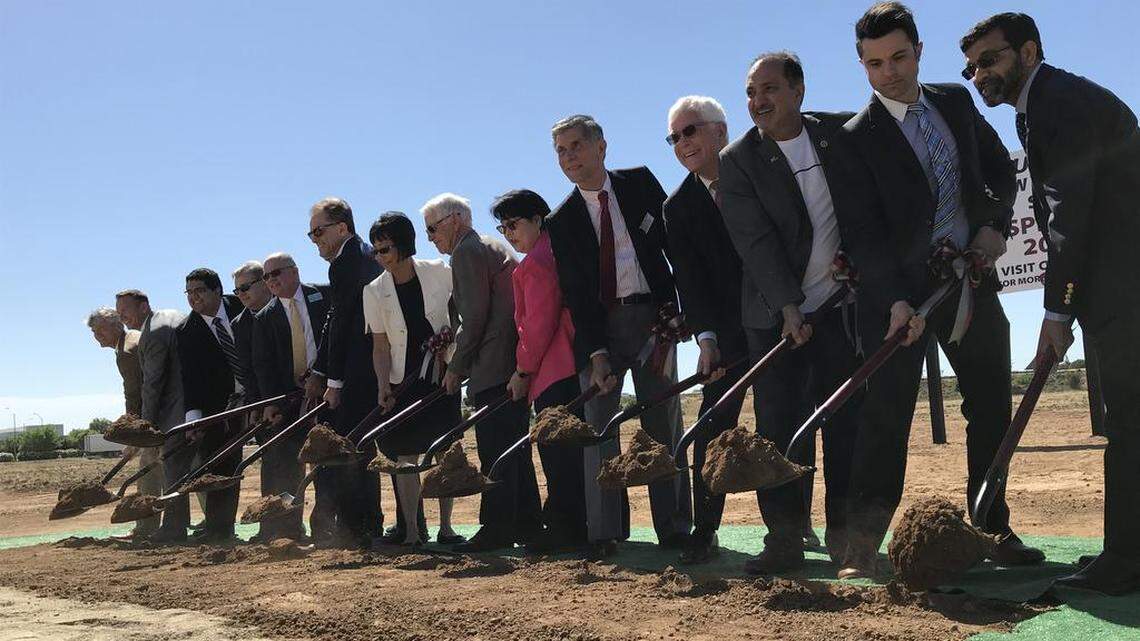 Clovis city officials join Assemi family members in breaking ground for a new medical school to be built in the city.