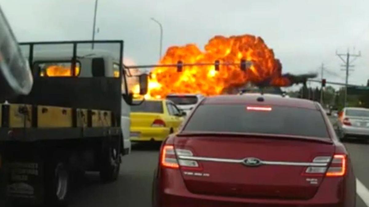 An image from video showing a fireball trailing a small plane that crashed near a busy boulevard in Mukilteo, Washington, on Tuesday, May 2, 2017.