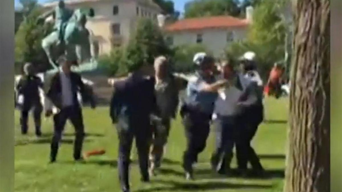 An image from video show Washington, D.C., trying to quell a clash between protesters and Turkish President Erdogan’s guards Tuesday, May 16, 2017.