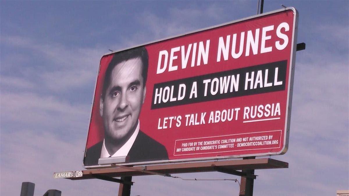 A billboard in Visalia urges Rep. Devin Nunes, R-Tulare, to hold a town hall meeting.
