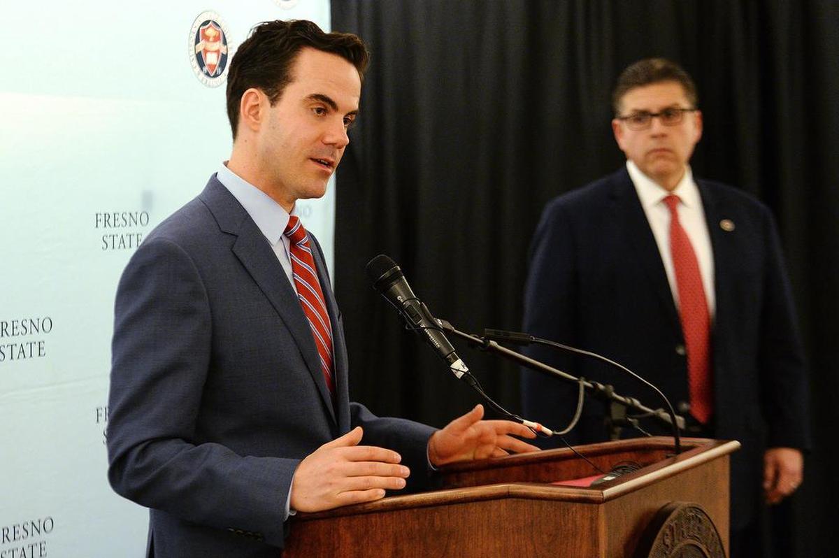 Robert Costa, Washington Post political reporter and moderator of PBS’s “Washington Week,” speaks to the media prior to his Fresno State lecture “An In-Depth Conversation with Robert Costa: Inside the Trump White House, Congress and the Future for Both Parties” while Fresno State President Joseph Castro stands nearby at the Save Mart Center on Tuesday, Nov. 27, 2108.