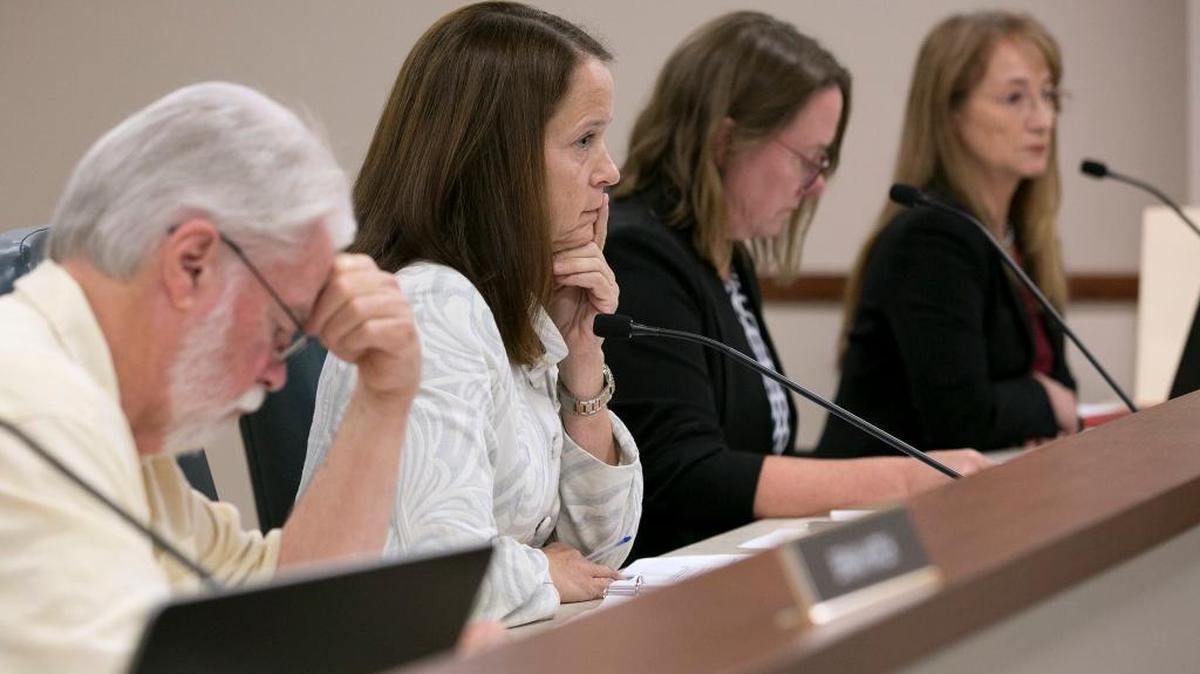 Jodie Remke, second from left, former chair of the California Fair Political Practices Commission, listens to a discussion on Aug. 17, 2017, in Sacramento. Other commission members seen are, from left, Brian Hatch, Allison Hayward, third from left, and Maria Audero, right. Remke and Audero resigned from the commission in 2018.