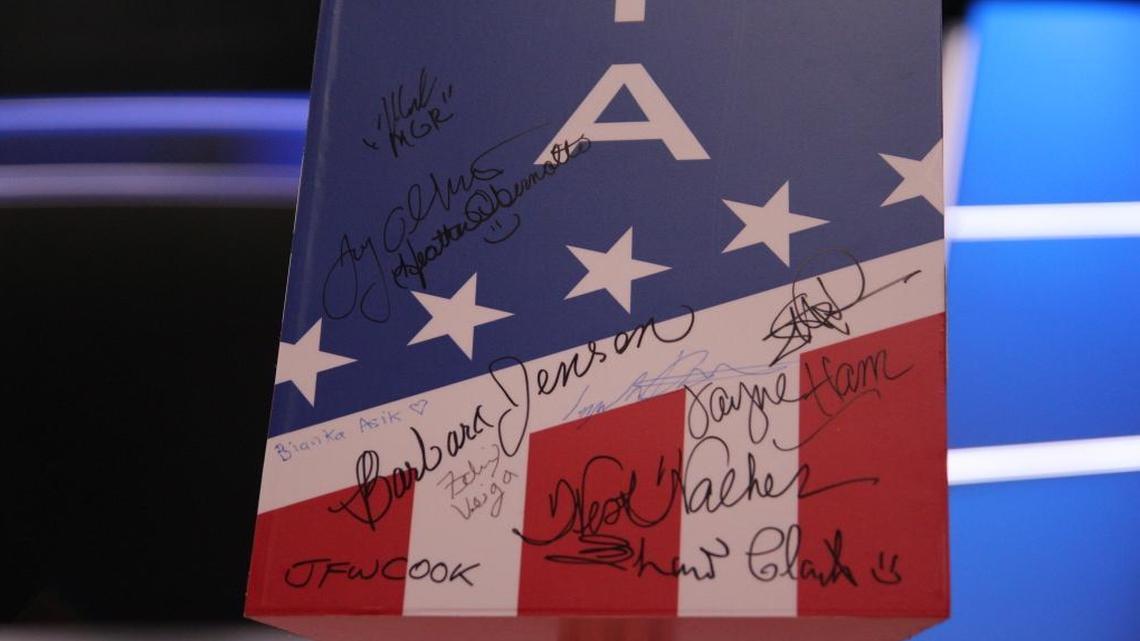 California delegates proudly display their signatures on their state sign on the floor of the Republican National Convention in Cleveland.