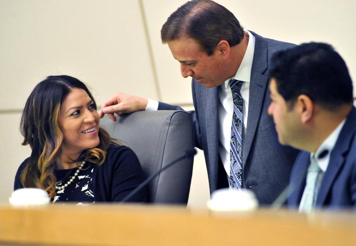 Fresno City Council President Esmeralda Soria talks with Councilmen Garry Bredefeld, center, and Luis Chavez during a break in a meeting on Thursday, Feb. 15, 2018.