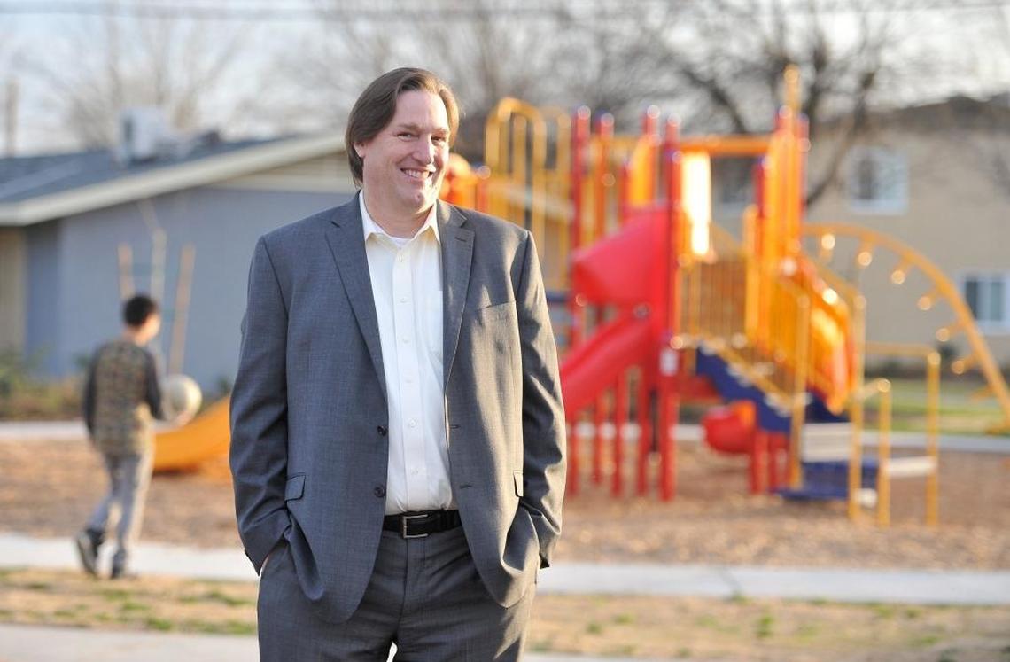 Preston Prince, executive director of the Fresno Housing Authority, stands in front of a playground at Cedar Courts, a southeast Fresno public housing complex.
