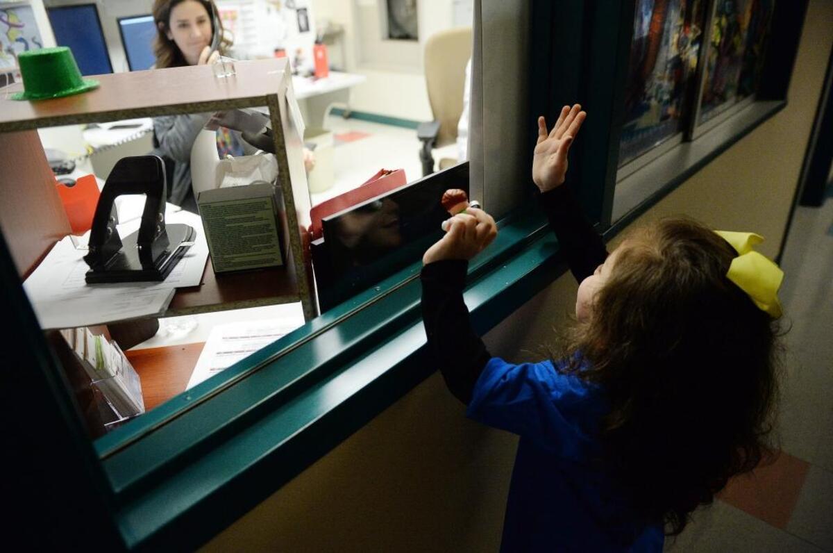Samantha “Sammy” Leal, 4, waves to a nurse from the hallway of the oncology unit on the last day of her chemotherapy treatments for a tumor at Valley Children’s Hospital on Monday, Jan. 30, 2018.