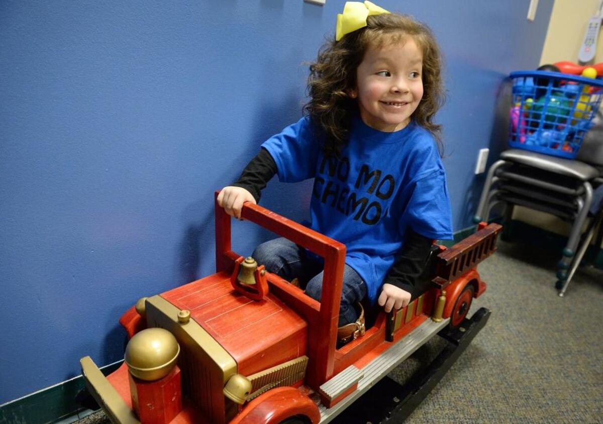 Samantha “Sammy” Leal, 4 rides a toy fire truck the last day of her chemotherapy treatments for a tumor at Valley Children’s Hospital on Monday, Jan. 30, 2018.