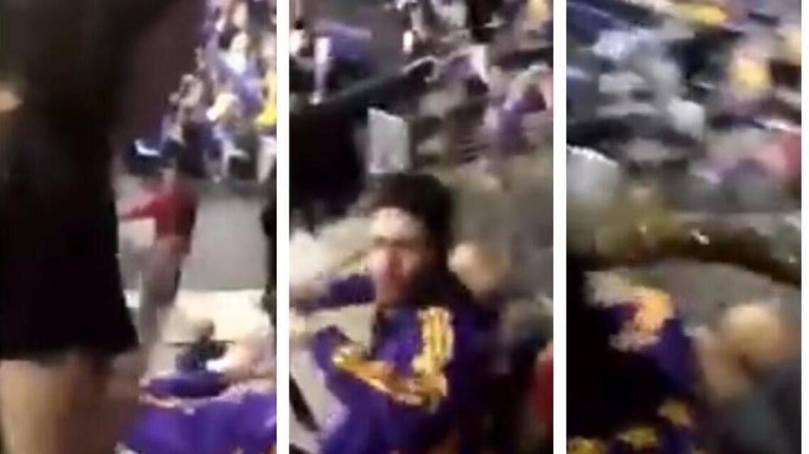 Two fans sat during the anthem at a Lakers game. She took offense – and action