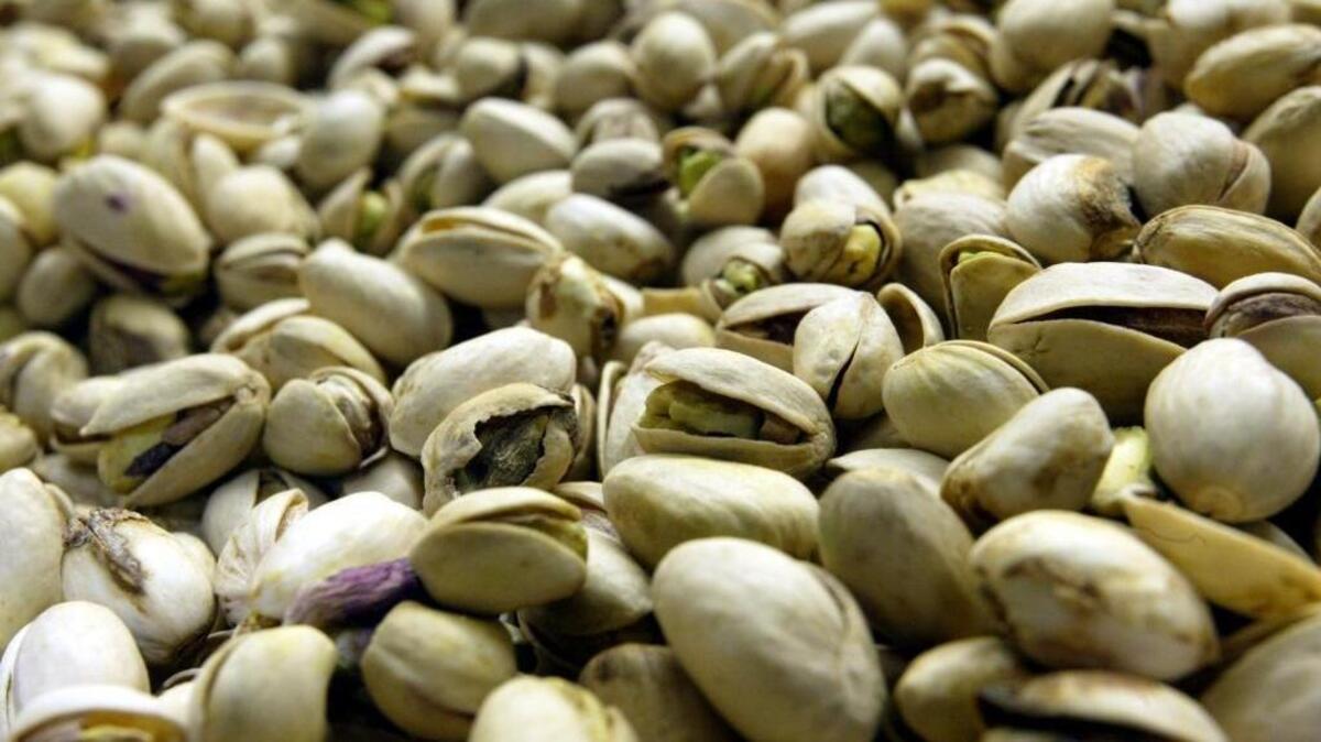 Pistachios await the sorting machine at A&P Growers in Tulare in this file photo.