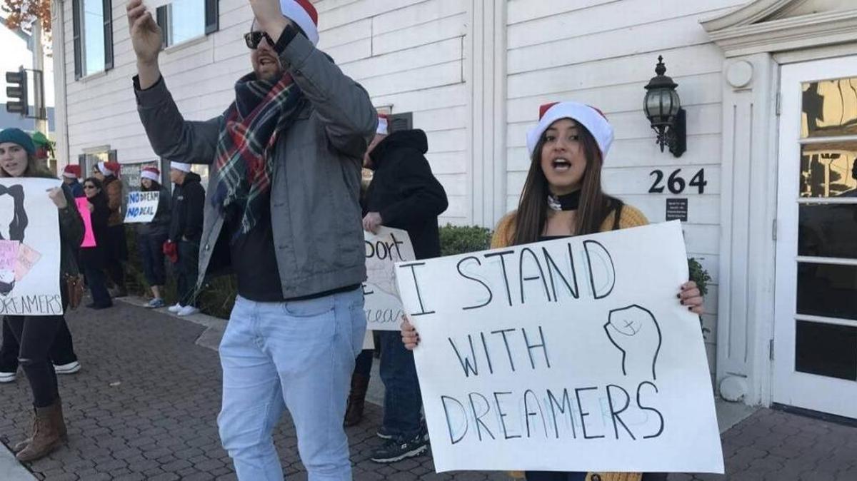 Jorg Letkemann, left, and Valeria Ayala demonstrate outside Rep. Devin Nunes’ Clovis office earlier this year. They and other activists want Congress to pass a bill that will allow so-called Dreamers stay in the United States without deportation.