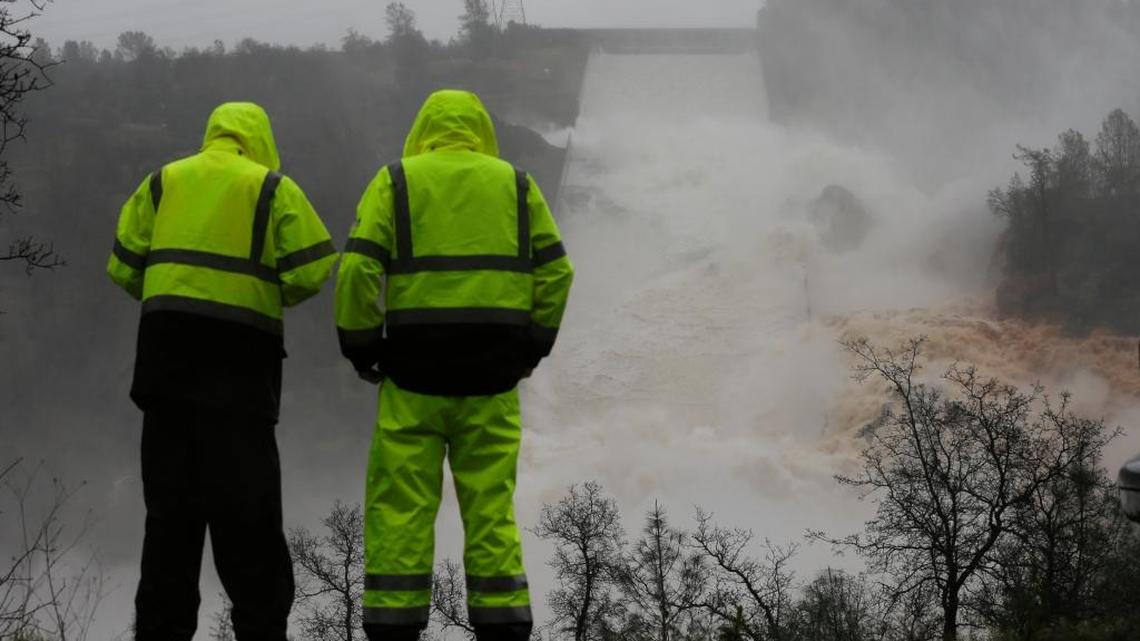 Water rushes down the Oroville Dam spillway on Thursday in Oroville.
