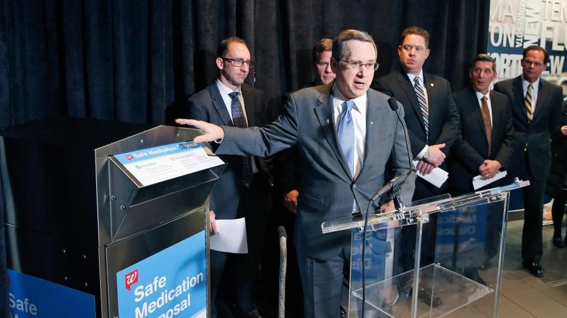 Richard Ashworth, president for pharmacy and retail operations for Walgreens, listens at left as Sen. Mark Kirk, R-Ill. speaks during a news conference on Capitol Hill on Feb. 9. The company plans to install safe medication disposal kiosks in more than 500 drugstores by year’s end.