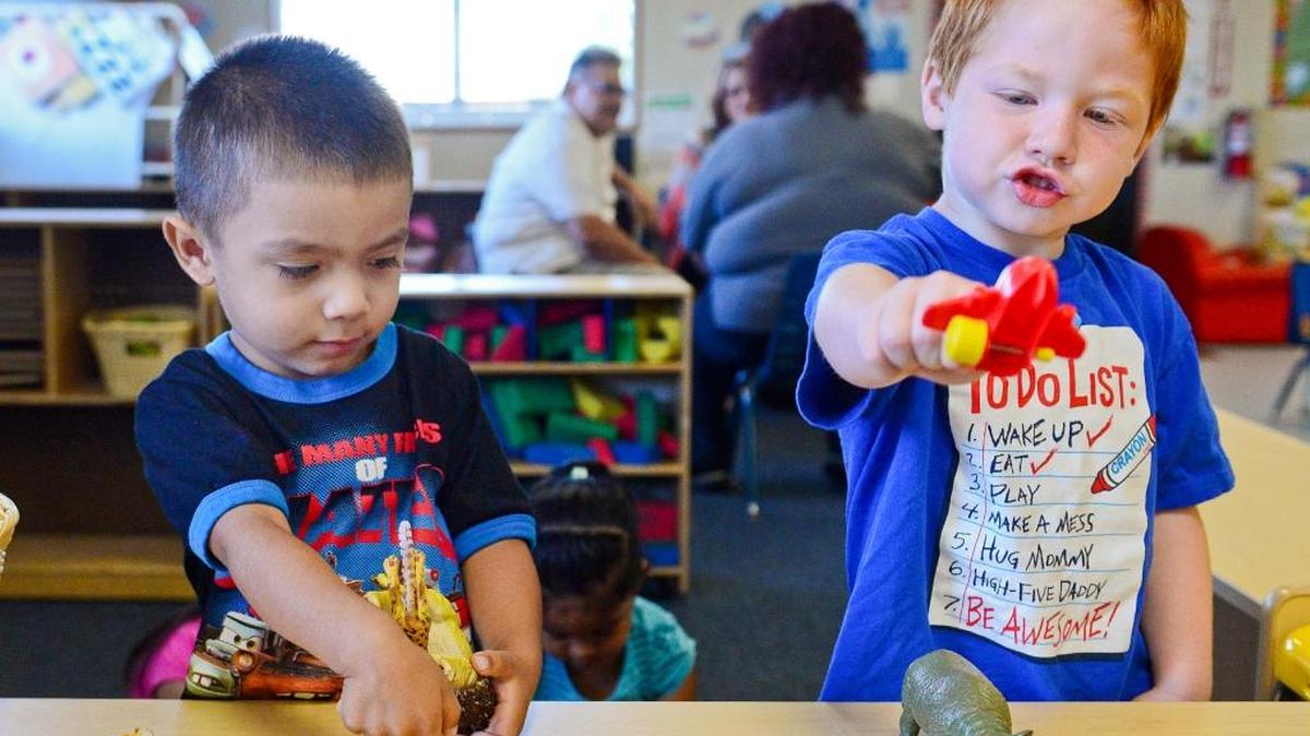 
Students Damien Marquez, left, and Jayson Smith take advantage of playtime following breakfast at San Joaquin Preschool in San Joaquin in 2014.
