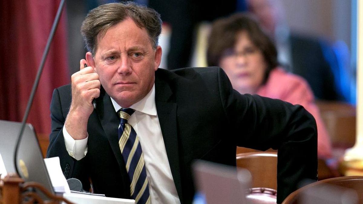 Sen. Josh Newman, D-Fullerton, listens as lawmakers debate a measure to change the rules governing recall elections, at the Capitol. Records show that an attorney for Senate Democrats spoke behind the scenes with Fair Political Practices Commission member Brian Hatch before the commission voted on a longstanding rule that restricts how much money Newman can raise from fellow lawmakers to fight a recall.
