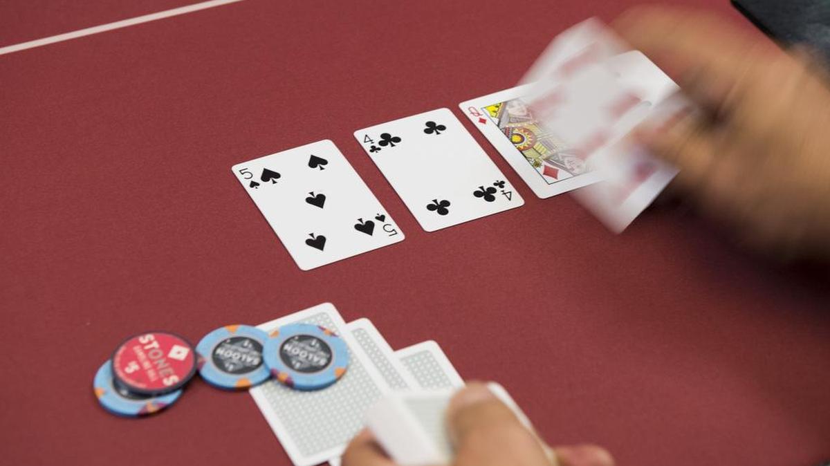 A game of Texas Hold ’em is dealt at the Stones Gambling Hall in Citrus Heights. A bill by Assemblyman Adam Gray would legalize poker on the internet in California.