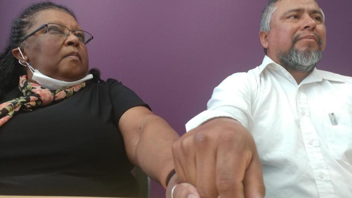 Carolyn Dickson and Jose Espinoza hold hands during their first meeting Oct. 28 in Fresno. Dickson had a double-lung transplant and the lungs came from Espinoza’s late wife, Maria Castro Martinez.