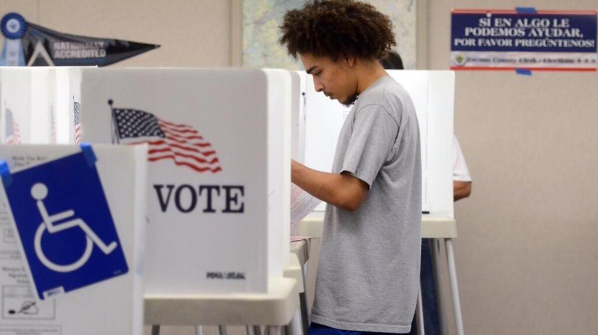 Patrick Gossett, of Fresno, votes during the presidential election on Tuesday, Nov. 8, 2016, at the Boy Scouts of America polling place in northwest Fresno.