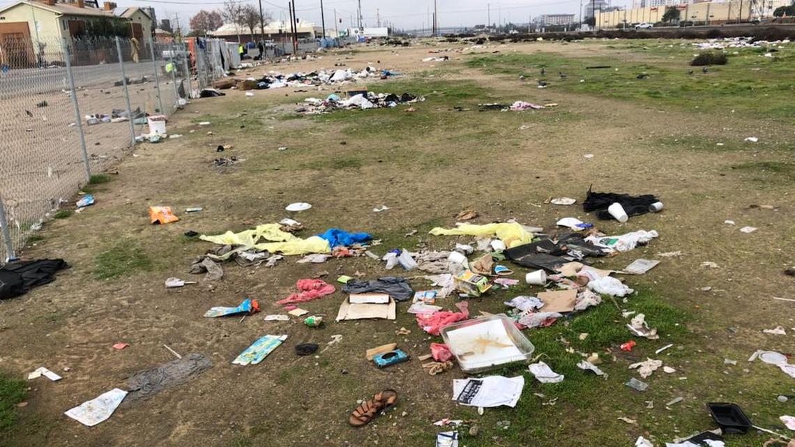 Trash left over from the holidays litters property near the Rescue Mission in downtown Fresno. A clean up is planned Saturday and volunteers are needed.