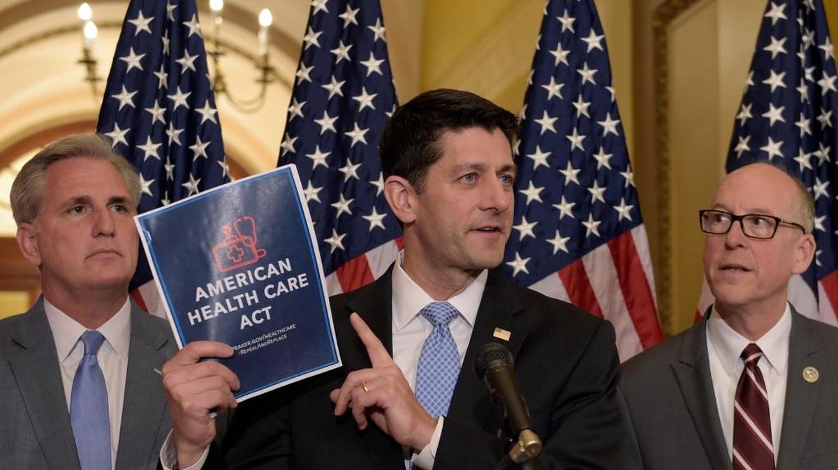 House Speaker Paul Ryan of Wis., center, standing with Energy and Commerce Committee Chairman Greg Walden, R-Ore., right, and House Majority Whip Kevin McCarthy, R-Calif., left, speaks during a news conference on the American Health Care Act on Capitol Hill in Washington, Tuesday, March 7, 2017. (AP Photo/Susan Walsh)