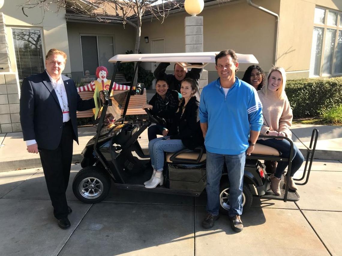 A new golf cart for Ronald McDonald House Charities, let’s celebrate. From left, Kent Karsevar, Executive Director, RMHC; Sven Hamilton, director of volunteer services and community outreach; Marisa Moore, director of development and communications; Gianna Heredia-McCampbell, Celebration Church; Mike Gardner, Church on Wheels; and Brandi Walcott and Shawnee Romero of the church.
