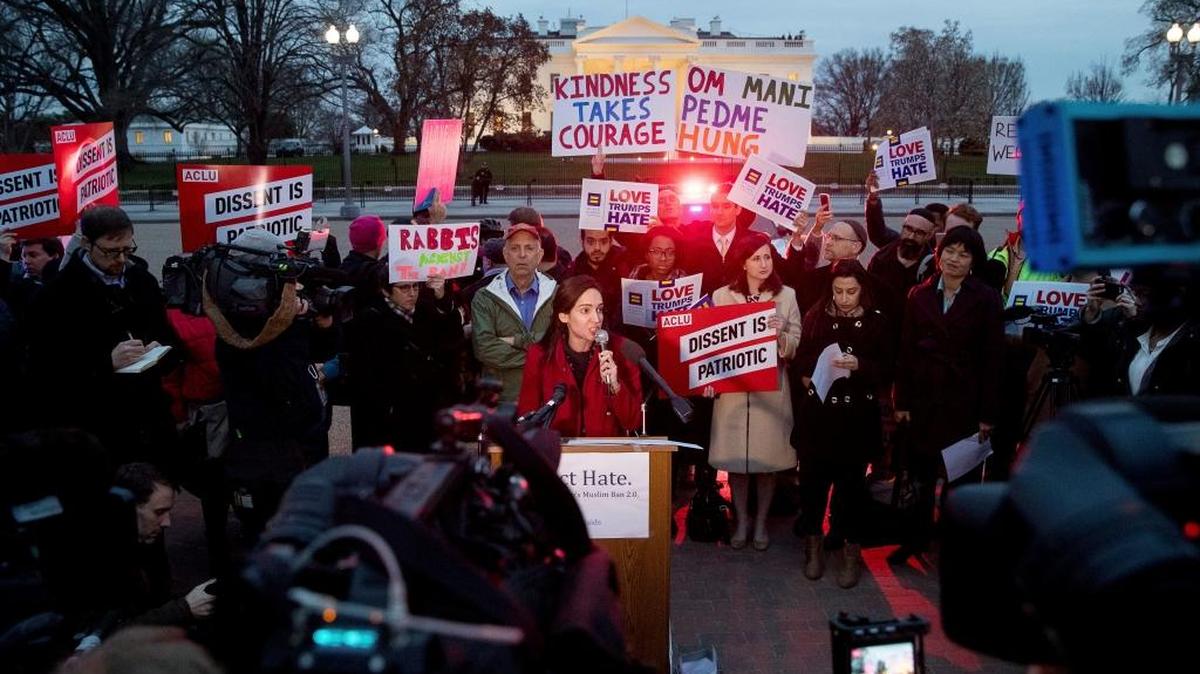 People gather for a protest against President Donald Trump’s new travel ban order outside the White House on Monday, March 6, 2017.