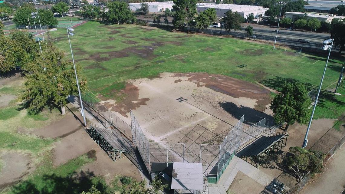 A drone photo shows unkempt fields at Fink-White Park in west Fresno. Measure P, the sales tax hike to benefit Fresno parks, will be decided by city voters at the polls Tuesday.