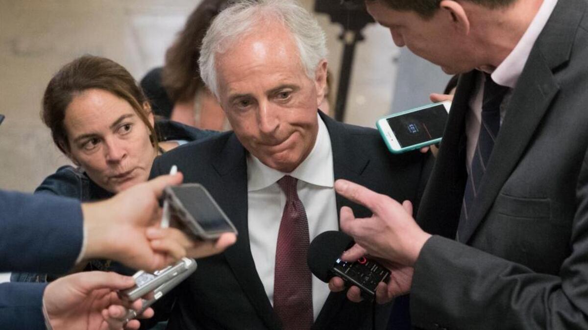 Senate Foreign Relations Committee Chairman Sen. Bob Corker, R-Tenn., is surrounded by reporters looking for a reaction on President Donald Trump's meeting with Russian officials, Tuesday, May 16, 2017, on Capitol Hill.