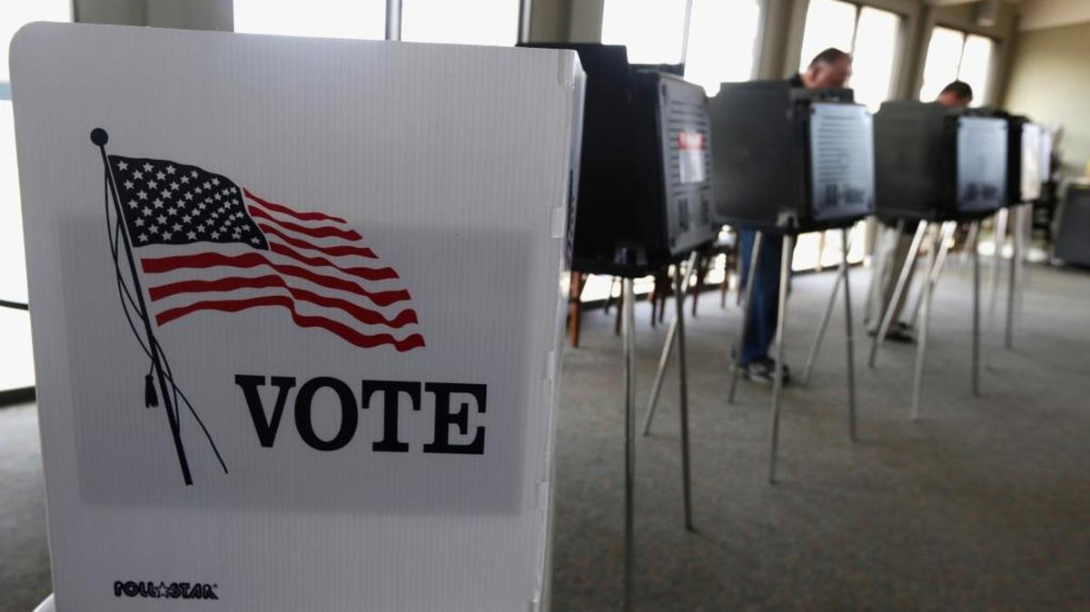 Voters cast their ballots in this 2014 file photo. The results of the 2020 Census determine how many members voters in each state get to represent them in the House of Representatives.