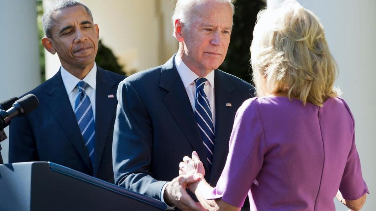 President Barack Obama watches as Vice President Joe Biden turns to his wife Dr. Jill Biden after announcing that he will not run for the presidential nomination, Wednesday in the Rose Garden of the White House in Washington.