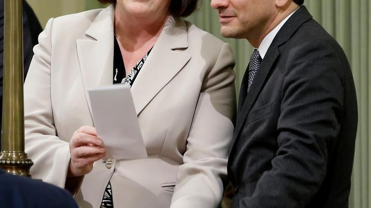 Assembly Speaker Toni Atkins, D-San Diego, talks with Assemblyman Anthony Rendon, D-Lakewood, as lawmakers debate a package of bills aimed at restricting access to tobacco on Thursday. Rendon was sworn in as the new Assembly speaker on Monday, replacing Atkins, who will be termed out of office at the end of this year’s legislative session.