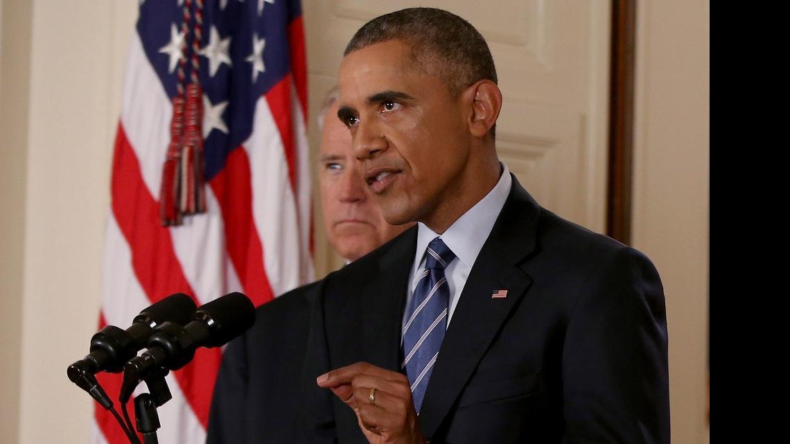
President Barack Obama, standing with Vice President Joe Biden, heralded a historic nuclear agreement with Iran Tuesday as an opportunity for the longtime foes to move in a “new direction,” while sharply warning Congress that it would be irresponsible to block the accord. 

