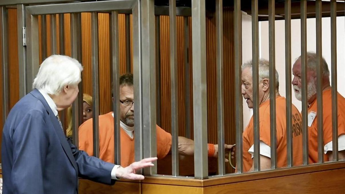 From left in orange, Backpage.com CEO Carl Ferrer and former owners James Larkin and Michael Lacey in Sacramento Superior Court in 2016.