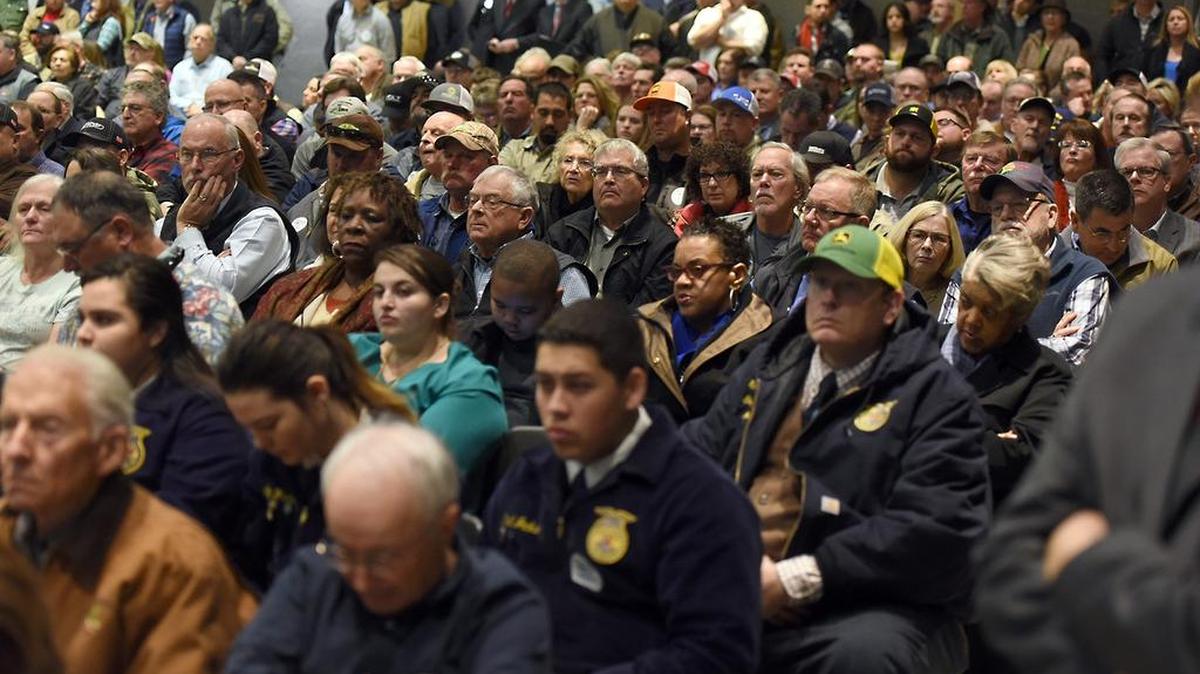 People listen in a packed house Tuesday morning, Dec. 20, 2016, during a presentation by the State Water Board in Modesto. The board proposes to boost flows on the Stanislaus, Tuolumne and Merced rivers, resulting in reduced irrigation deliveries.