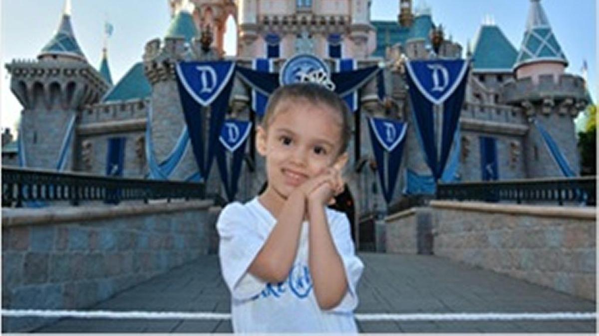 Emily G. of Fresno, who has neuroblastoma, was granted a trip to Disneyland with her family from Make-A-Wish.