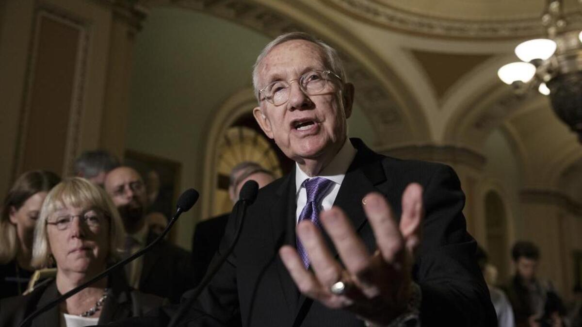 Senate Democratic Leader Harry Reid of Nevada talks to reporters Tuesday about the stalemate over $1.1 billion in Zika funding.