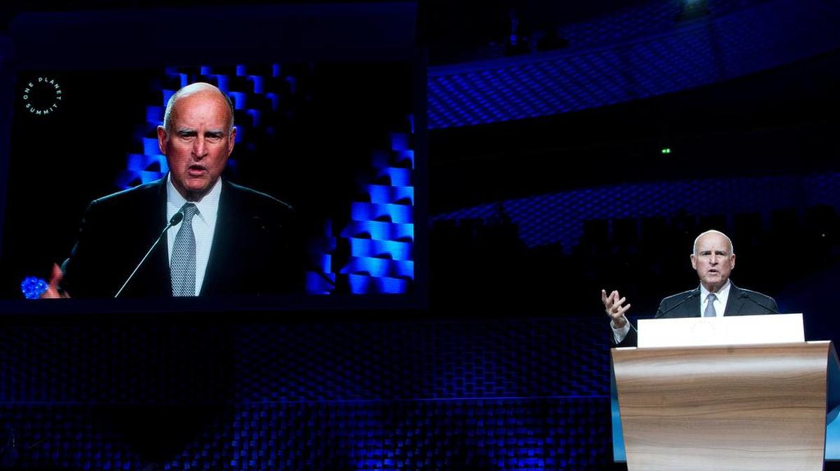 California Gov. Jerry Brown speaks to delegates as part of a session of the One Planet Summit, in Boulogne-Billancourt near Paris on Tuesday. More than 50 world leaders gathered for a summit that President Emmanuel Macron hopes gives new momentum to the fight against global warming despite U.S. President Donald Trump's rejection of the Paris climate accord.