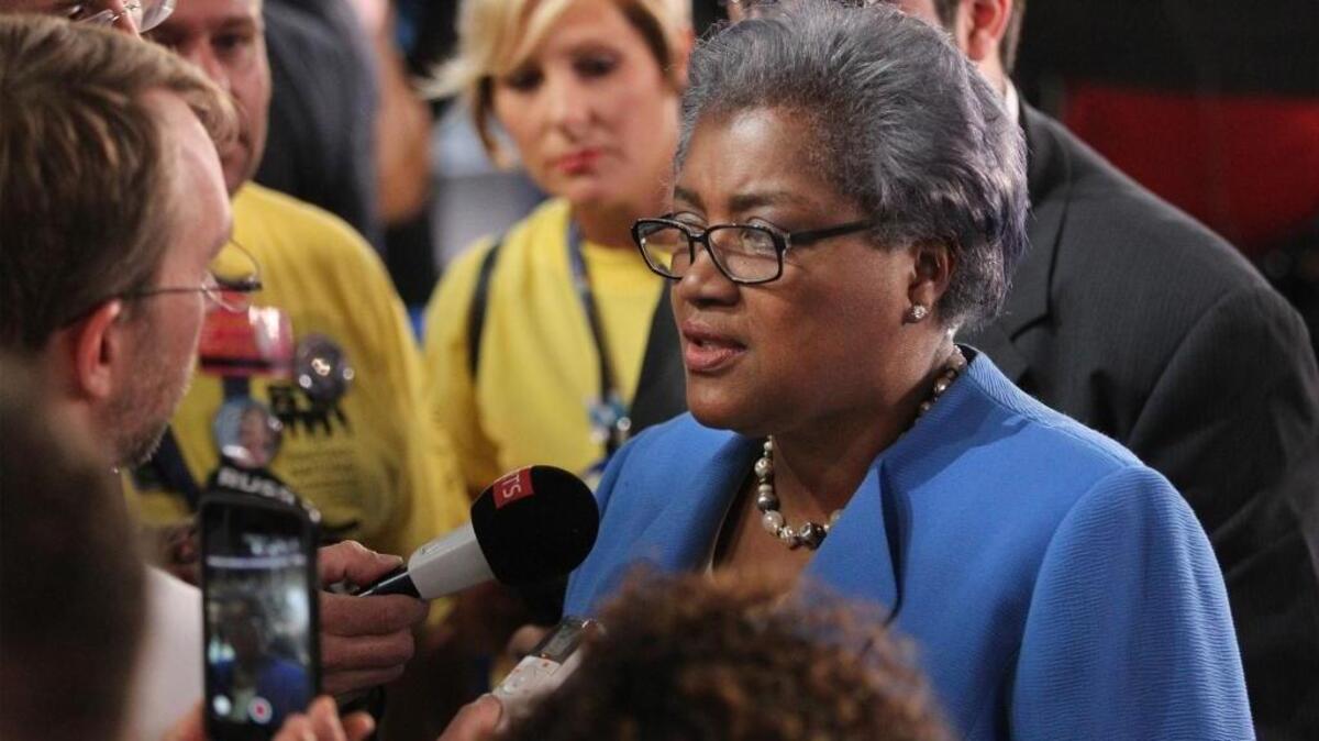 Donna Brazile, interim chairwoman of the Democratic National Committee, answers questions at the Democratic National Convention in July. She resigned as a CNN political analyst after Wikileaks revealed that she had fed presidential debate questions to Hillary Clinton.