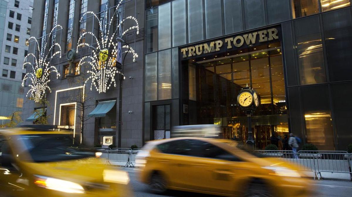 Traffic passes Trump Tower in New York on Nov. 21. Pressure is building on President-elect Donald Trump to do more to head off conflicts of interest between his business holdings and his decisions as president.