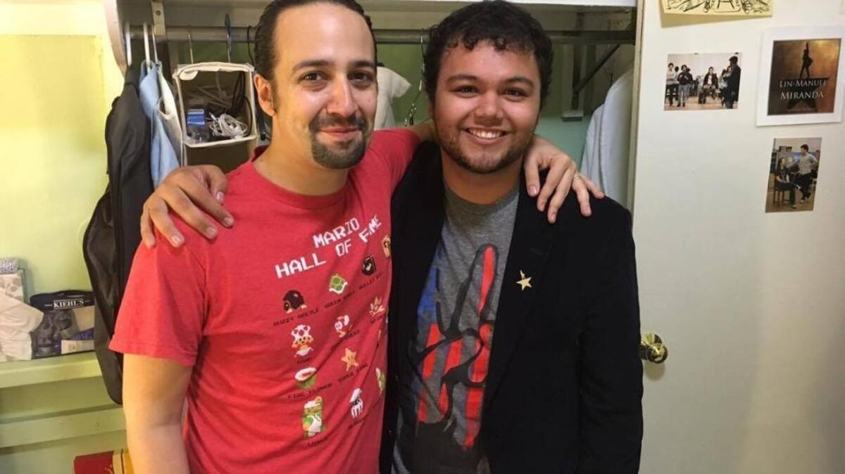 Dominic Grijalva of Selma, right, landed a T-shirt design job for Broadway’s biggest name, Lin-Manuel Miranda.