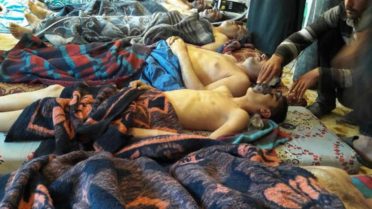 In this picture taken Tuesday, April 4, 2017, victims of the suspected chemical weapons attack lie on the ground, in Khan Sheikhoun, in the northern province of Idlib, Syria. The death toll rose to 72 Wednesday as activists and rescue workers found more terrified survivors hiding in shelters near the site of the harrowing assault, one of the deadliest in Syria’s civil war.