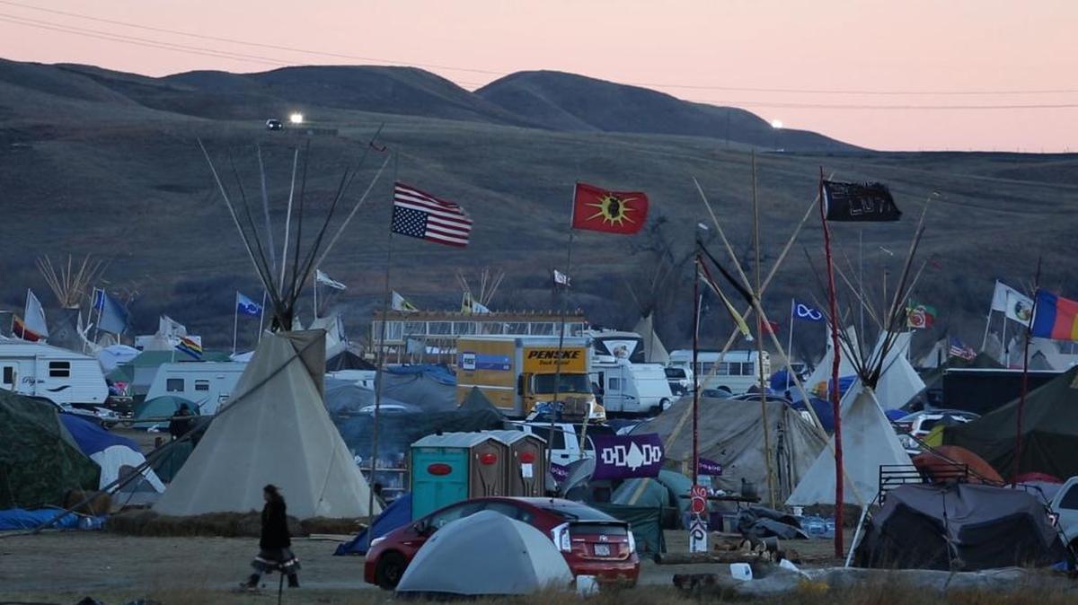 The sun sets over the Oceti Sakowin camp where protesters at Standing Rock settled in for the winter.
